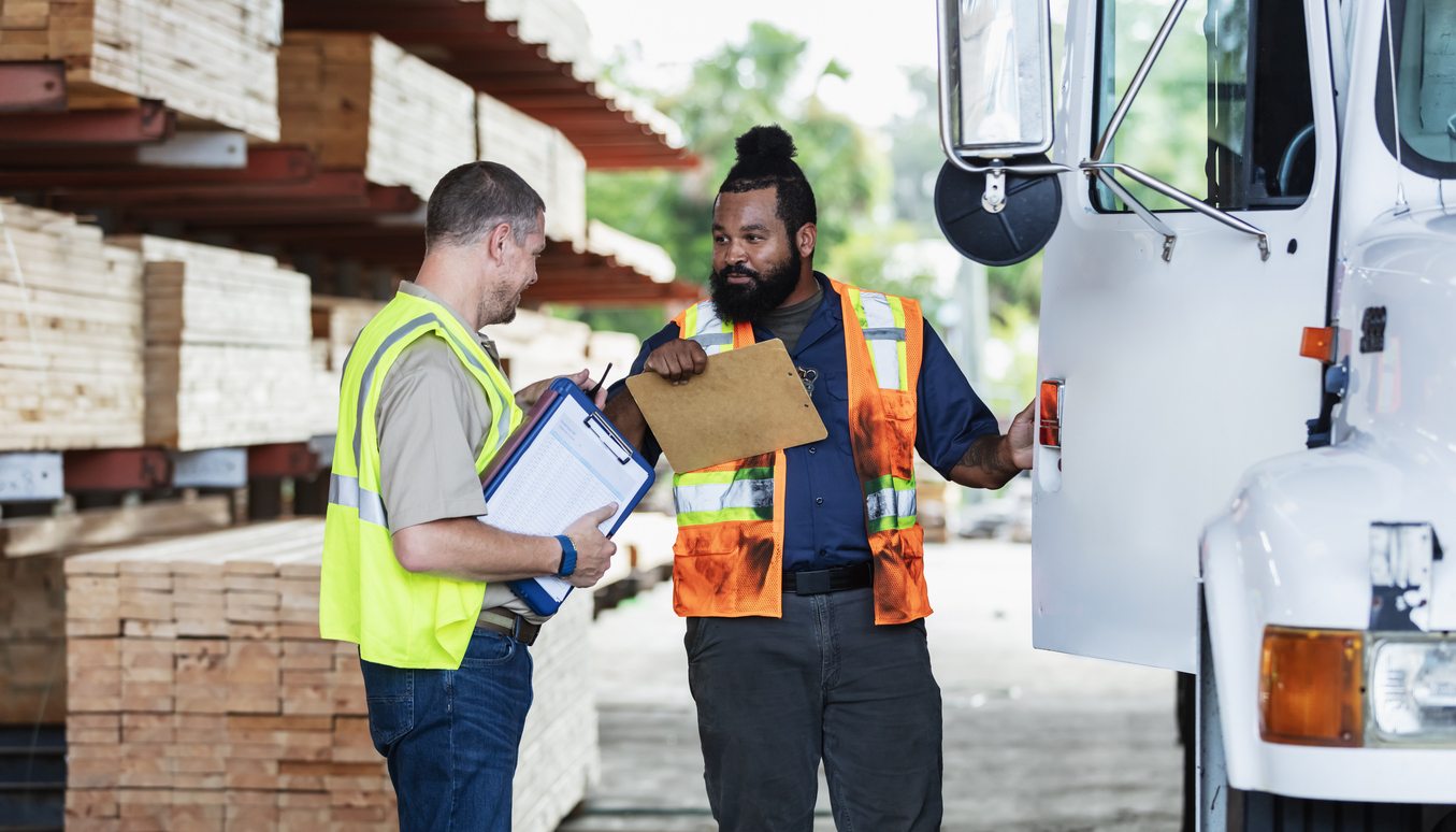 Managing Inventory for Field Service Businesses and Construction Projects Two men in construction clothes outside of a truck Managing an Inventory delivery for a construction project