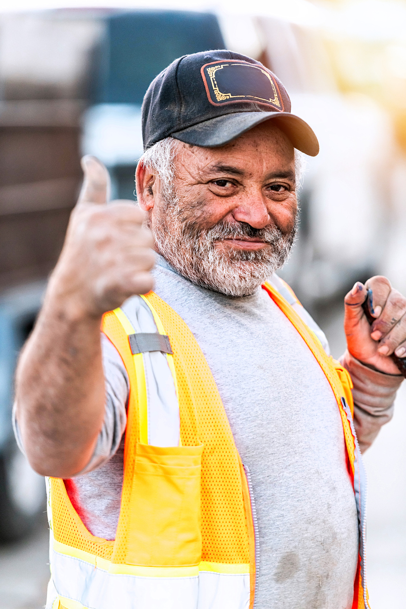 What contractors need to know about tracking KPIs for their construction companies An older construction manager puts a thumbs-up